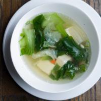 Tofu Soup · Vegetable, tofu in clear vegetable broth, fried garlic, scallion and cilantro.