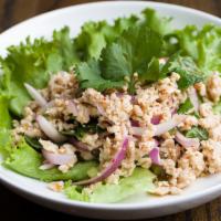 Larb Gai Salad · Minced Chicken, red onion, mint, toasted rice powder, chili powder, cilantro and lettuce wit...