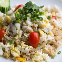 Crab Meat Fried Rice · Steamed Jasmin rice, Crab meat, egg, tomato, scallion and cucumber top with cilantro.