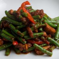 Prik King · Sauteed with garlic, chili paste, green bean, carrot and bell pepper in homemade sauce. Serv...