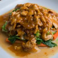 Rama · Sauteed with homemade peanut sauce on the top of steamed mix vegetable. Served with rice.