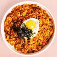 Kimchi Fried Rice · Fried rice with kimchi, a fried egg, and your choice of protein.