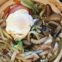 Nabeyaki Udon Soup · 2 shrimp tempura, chicken, vegetable and sunny side egg.