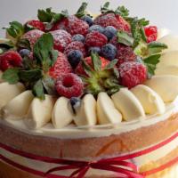 Fruit Cake · VANILLA BISCUIT, PASTRY CREAM, STRAWBERRY AND RASPBERRY.
