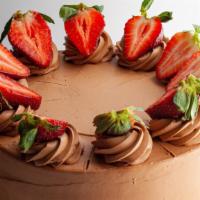 Strawberry Chocolate Cake · CHOCOLATE BISCUIT,
PASTRY CREAM, CHOCOLATE CREAM AND STRAWBERRY.