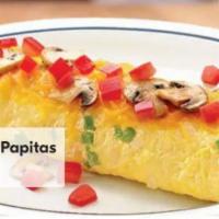 Garden Omelette Y Papitas · Garden omelette with potatoes.