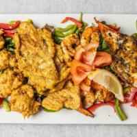 Grilled Shrimp & Lobster Platter · Served w/
-Fried Plantains
-Codfish Fritters