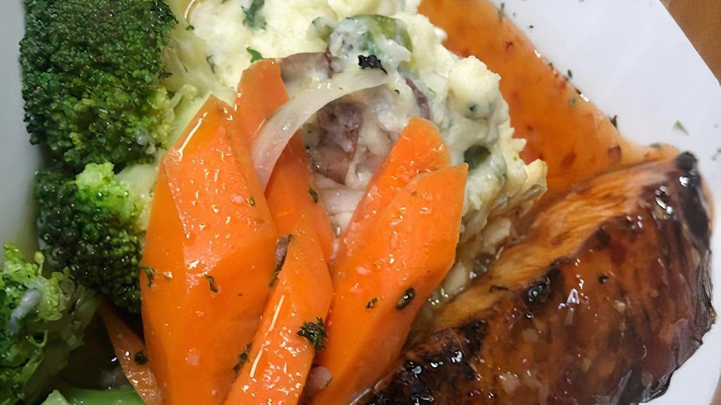 Wild Salmon · Grilled, Honey Glazed or Honey Garlic served with creamy mash potatoes and garlic steamed vegetables.