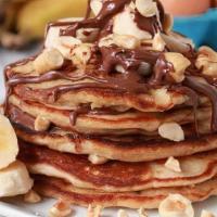 Nutella Banana Pancakes · 5 stack of pancakes with Nutella, and bananas