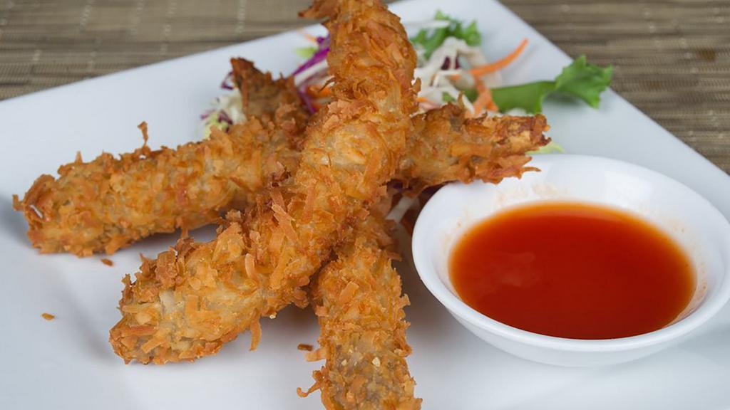 Coconut Shrimp · Jumbo white shrimp battered with shoved coconut and served with sweet chili sauce.