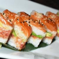 Royalty Roll · Pressed Osaka-style sushi, crunchy  spicy tuna, avocado, rice and fresh salmon with chili sa...