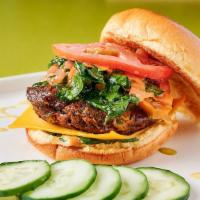 Veggie Burger · Home Made Veggie Burger,shredded carrots,crisp romaine,organic baby spinach,sliced tomato,mi...