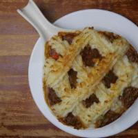Shepherds Pie · A piping hot skillet of ground -sirloin, herbs, and vegetables, topped with a lattice of our...