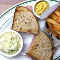 Corned Beef Sandwich · Piled high on rye bread with a touch of mustard.