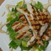 Robbie'S Caesar Salad · Our take on the classic; hearts of romaine, aged Parmesan cheese, house-made croutons, and R...