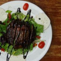 Portobello Mushroom Salad · House-made fresh Mozzarella, chopped sundried tomatoes, with marinated and grilled portobell...