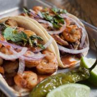 Camaron Taco · Roasted shrimp with red onions, garlic, black beans, finished with wild marjoram and chili o...