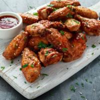 Honey Bbq Wings - Bone-In · Classic bone-in wings oven-baked, topped with Honey BBQ sauce, cooked to order and perfectly...