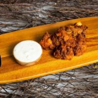 Mango Man Habanero Wings · (Mango Habanero) Served with celery or carrots, and blue cheese or ranch.