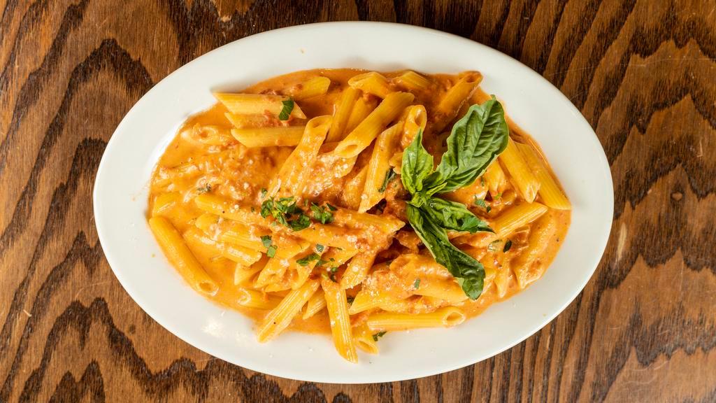 A La Vodka Pasta · A sautéed of olive, shallots, and pancetta deglazed with vodka and simmered with tomatoes and cream.
