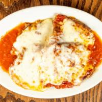 Eggplant Parmigiana · Served with pasta or salad and bread or garlic knots.