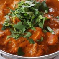 Chicken Tikka Masala · Boneless chicken from oven cooked with onion, green peppers, tomato sauce, and cream. Served...