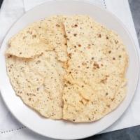 Papad · Thin crisp Indian cracker or flatbread.