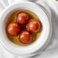 Gulab Jamun · Donut milk cakes soaked in special sweet syrup.