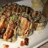 Volcano Roll · Spicy. Mixed fish, crab meat, avocado deep fried with chef's special sauce on top.
