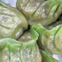 Spinach Dumplings · Six pieces. Dumplings filled with cabbage, bamboo shoots and mushrooms.