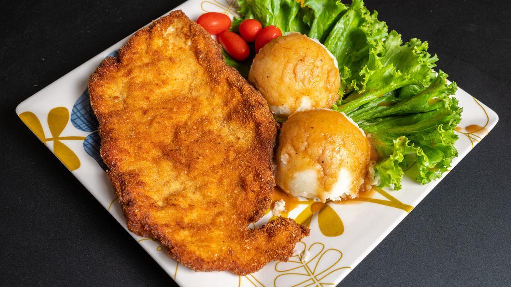 Chicken Cutlet Meal · Chicken, side dish, choice of salad.