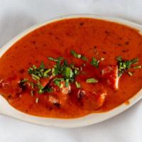 Chicken Tikka Masala · Boneless chicken, onions, tomatoes, bell peppers cooked with mild spices.