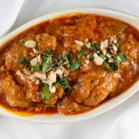 Chicken Korma · Onions, tomatoes and yogurt cooked with medium spices.