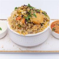 Vegetable Biryani · Basmati rice prepared with a mixed vegetable gravy