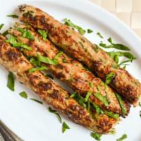 Chicken Seekh Kabab (2 Pc) · Chicken, onions, coriander, green chili and herbs.