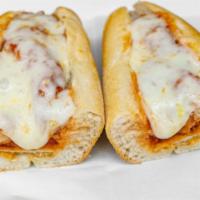 Chicken Cutlet Hero · Breaded cutlet topped with sauce and cheese.