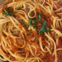 Pasta With Marinara Sauce · Fresh tomatoes sautéed with garlic, oil and oregano.
