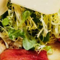 Grilled Chicken Paillard · With frisée, tomato confit, and shaved parmesan.