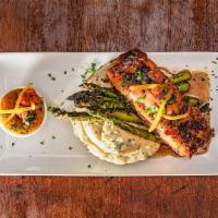 Honey Jerk Salmon · Served with mash potatoes and asparagus.