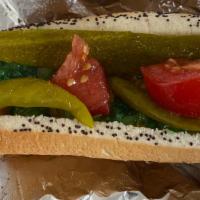 Chicago Dog · Spicy mustard, relish, onions, lettuce, tomato and pickle spear.