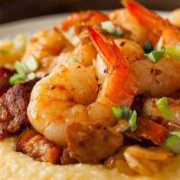 Sauteed Shrimp Bowl · Spanish rice, sauteed peppers, onions, avocado, black beans, corn and lettuce.