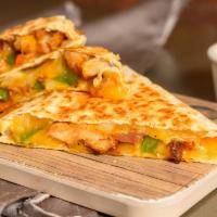 Grilled 3-Cheese Quesadilla · Served with sautéed peppers and onions.