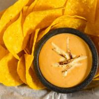 Housemade Chipotle Queso Dip & Chips · 