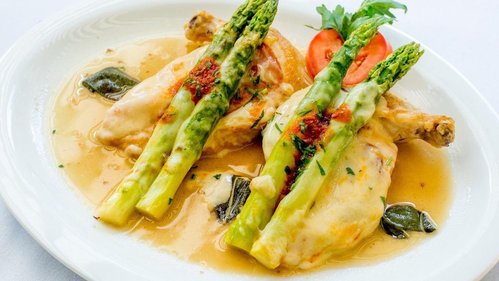 Pollo Farcito · Chicken breast sauteed with white wine, shallots, sage, topped with prosciutto asparagus and mozzarela cheese