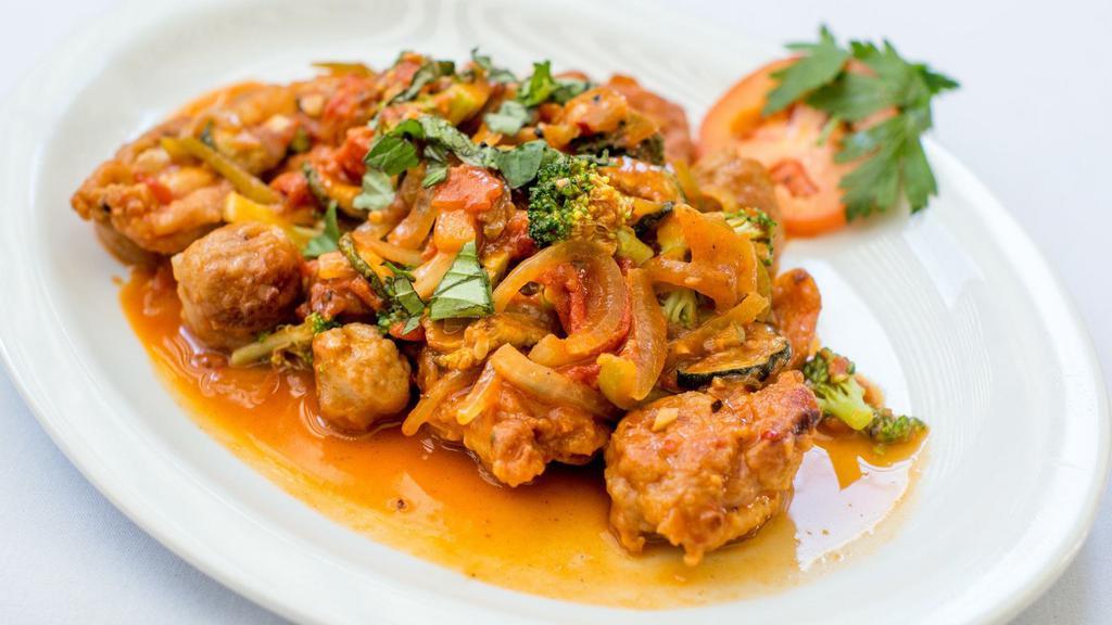 Pollo Falco · Chicken and sausage sauteed in a spicy tomato sauce with zucchini and broccoli