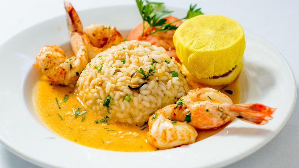 Shrimp Scampi · Jumbo Shrimps sauteed with white wine, garlic and oil served with risotto