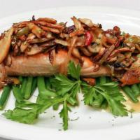 Salmon Al Porcini · Wild salmon grilled, served over string beans, and topped with sauteed onions, mushrooms, an...