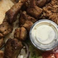 Pork Souvlaki Plate · Served with pita, side of tzatziki and a choice of lemon potatoes, french fries or brown rice.