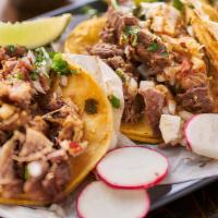 Tacos De Carnitas (3 Per Order) · Freshly made soft tacos stuffed with juicy and fresh pull pork with chopped fresh cilantro a...