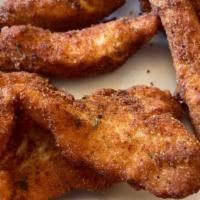 Chicken Fingers · A homemade basket full of breaded & fried chicken strips. Choice of honey mustard or BBQ sau...
